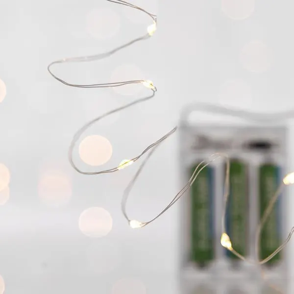 XMAS ΛΑΜΠΑΚΙ ΣΕΙΡΑ 20 MINI LED ΜΠΑΤΑΡΙΑΣ 3AA ΑΣΗΜΙ ΧΑΛΚΙΝΟ ΚΑΛΩΔΙΟ ΘΕΡΜΟ ΛΕΥΚΟ LED ΑΝΑ 10cm ΠΑΡΟΧΗ 30cm IP20