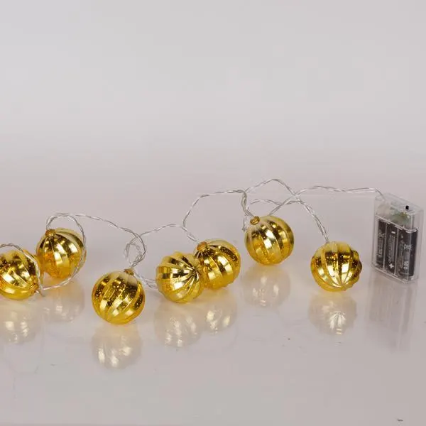 XMAS ΛΑΜΠΑΚΙ ΣΕΙΡΑ 10 LED 5mm ΧΡΥΣΗ ΜΠΑΛΑ ΠΛΑΣΤΙΚΗ ΜΠΑΤΑΡΙΑΣ 3AA ΜΕ ΧΡΟΝΟΔΙΑΚΟΠΤΗ ΔΙΑΦΑΝΟ PVC ΚΑΛΩΔΙΟ ΘΕΡΜΟ ΛΕΥΚΟ LED ΑΝΑ 15cm ΠΑΡΟΧΗ 30cm IP20