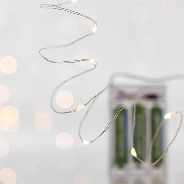 XMAS ΛΑΜΠΑΚΙ ΣΕΙΡΑ 20 MINI LED ΜΠΑΤΑΡΙΑΣ 3AA ΜΕ ΧΡΟΝΟΔΙΑΚΟΠΤΗ ΑΣΗΜΙ ΧΑΛΚΙΝΟ ΚΑΛΩΔΙΟ ΘΕΡΜΟ ΛΕΥΚΟ LED ANA 10cm ΠΑΡΟΧΗ 10cm IP20