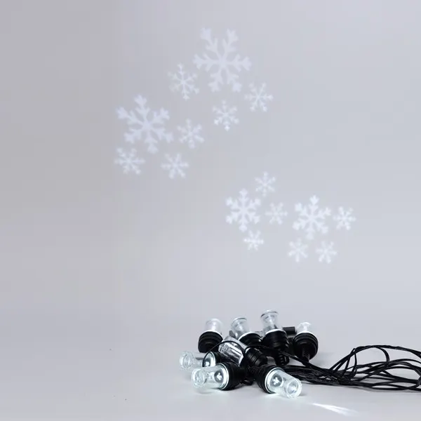 XMAS ΛΑΜΠΑΚΙ ΓΙΡΛΑΝΤΑ ΠΡΟΤΖΕΚΤΟΡΑΣ 8 LED ΧΙΟΝΟΝΙΦΑΔΑ 4.5V ΜΕΤΑΣΧΗΜΑΤΙΣΤΗ ΣΤΑΘΕΡΟ ΜΑΥΡΟ PVC ΚΑΛΩΔΙΟ ΛΕΥΚΟ LED ΑΝΑ 50cm ΠΑΡΟΧΗ 5m IP44